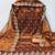 Women rust twill net embroidered unstitched dress material with dupatta