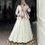 white Rayon Chaniya Choli with Embossed Design & Lace Detailing
