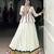 white Rayon Chaniya Choli with Embossed Design & Lace Detailing
