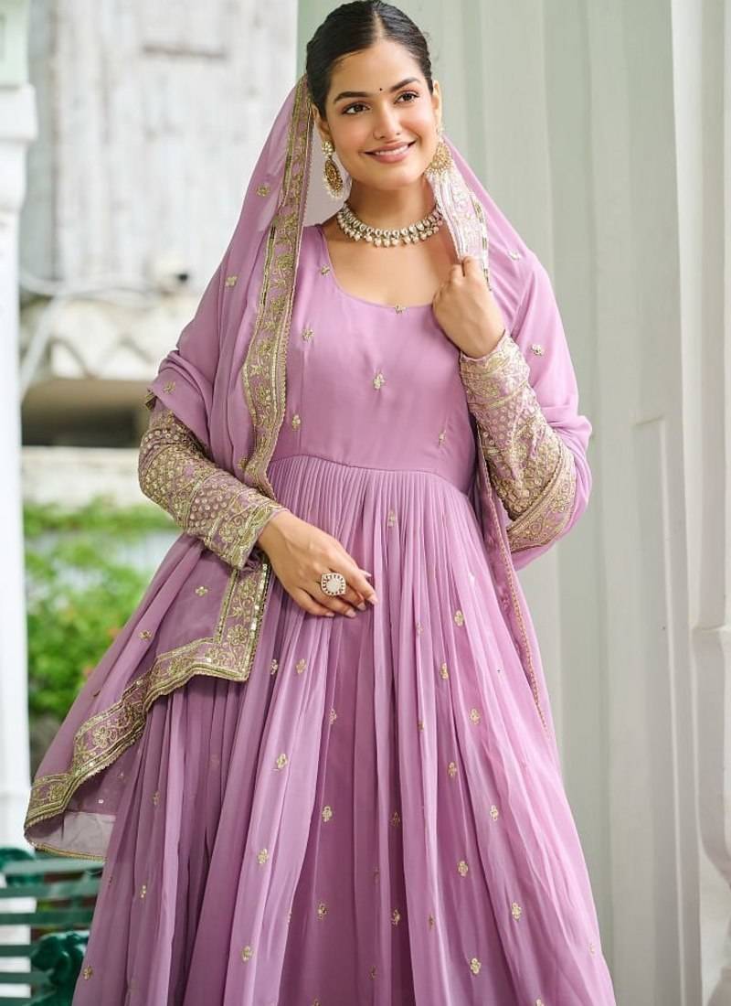 Unique dusty coloured faux georgette with embroidered work Full Stitched free size.