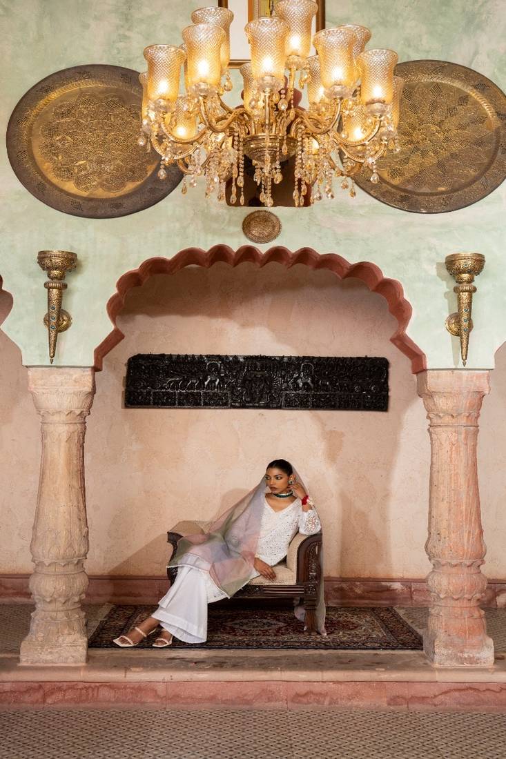 The luxury of our white chikan kari suit