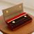Striped design faux leather rectangular clutch
