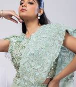 Green plain silk saree with belt