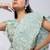 Green plain silk saree with belt