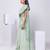 Green plain silk saree with belt