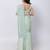 Green plain silk saree with belt