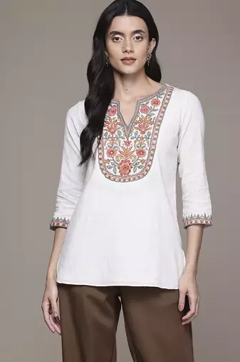 white cotton kurta with embroidered work design