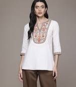 white cotton kurta with embroidered work design