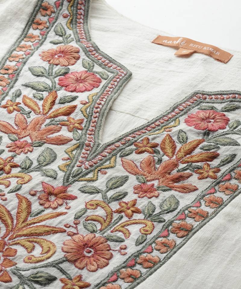 white cotton kurta with embroidered work design
