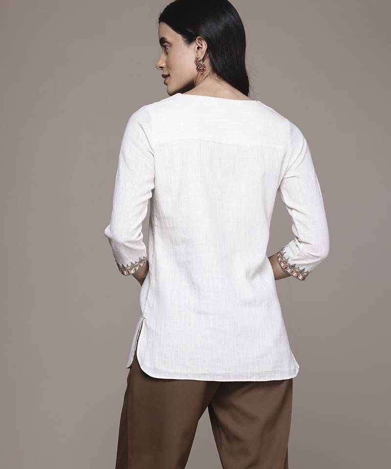 white cotton kurta with embroidered work design