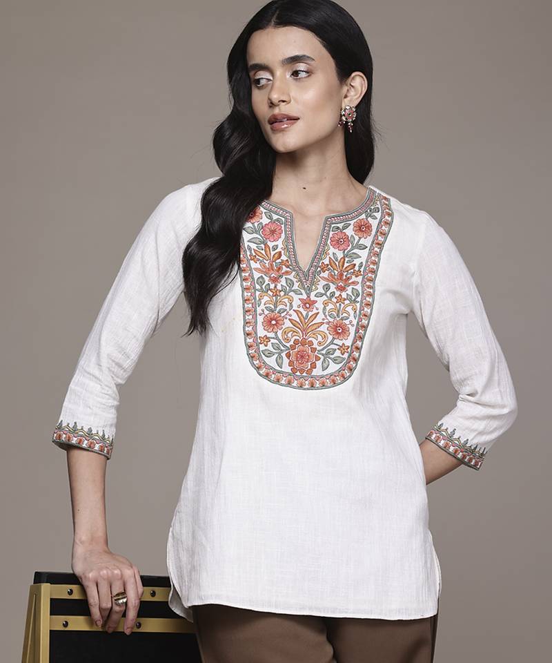 white cotton kurta with embroidered work design