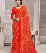Orange bandhani printed chiffon saree with unstitched blouse, ethnic indian attire