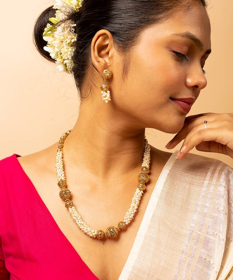 Pearl-adorned gold-tone long necklace & earrings set