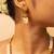 Pearl-adorned gold-tone long necklace & earrings set