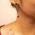 Gold-tone teardrop dangle necklace & matching stud earrings