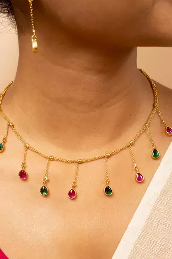 Gold-tone teardrop dangle necklace & matching stud earrings