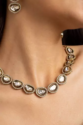Classic kundan necklace and earrings set with clear stones