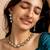 Classic kundan necklace and earrings set with clear stones