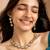 Classic kundan necklace and earrings set with clear stones