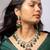 Royal gold-toned kundan necklace set with green beads and red detailing