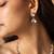 Elegant clear stone necklace and earring set