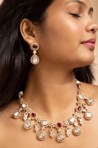 American diamond necklace set with red stone accents