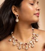 American diamond necklace set with red stone accents