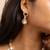 American diamond necklace set with red stone accents