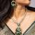 Elegant green stone pendant necklace set with kundan detailing