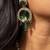 Elegant green stone pendant necklace set with kundan detailing