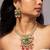 Traditional indian gold necklace set with green and pink gemstones
