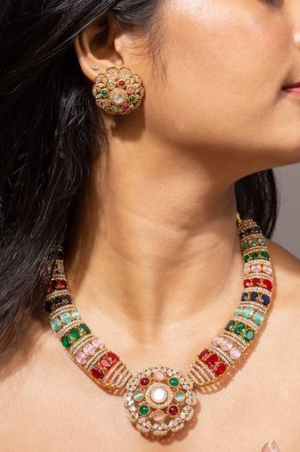 Colorful gold necklace set with multi-colored gemstones