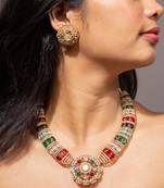 Colorful gold necklace set with multi-colored gemstones