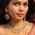 Stunning gold-toned kundan necklace set with pink and green bead drops