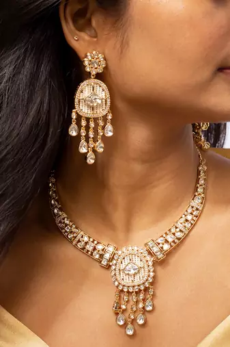 Elegant kundan and bead work necklace and earrings set