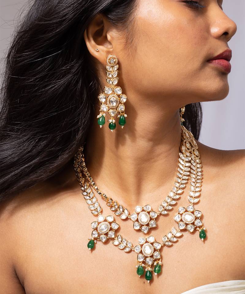 Grand kundan necklace set with green bead accents