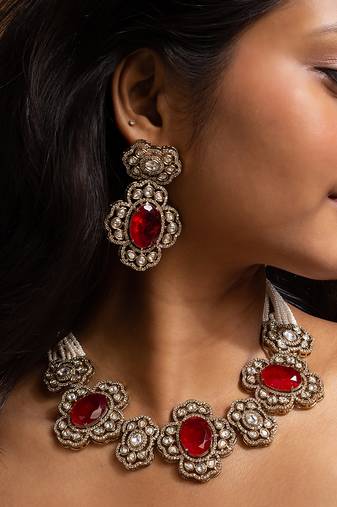 Antique floral choker necklace set with red stones and pearl strings