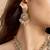 Elegant gold-toned necklace set with pink stones and pearls