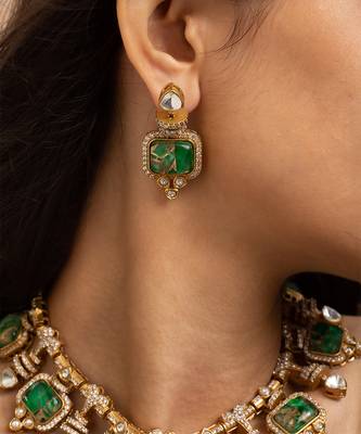 Indian necklace and earrings set with green and clear stone detailing 3