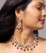 Floral kundan necklace set with ruby and emerald beads