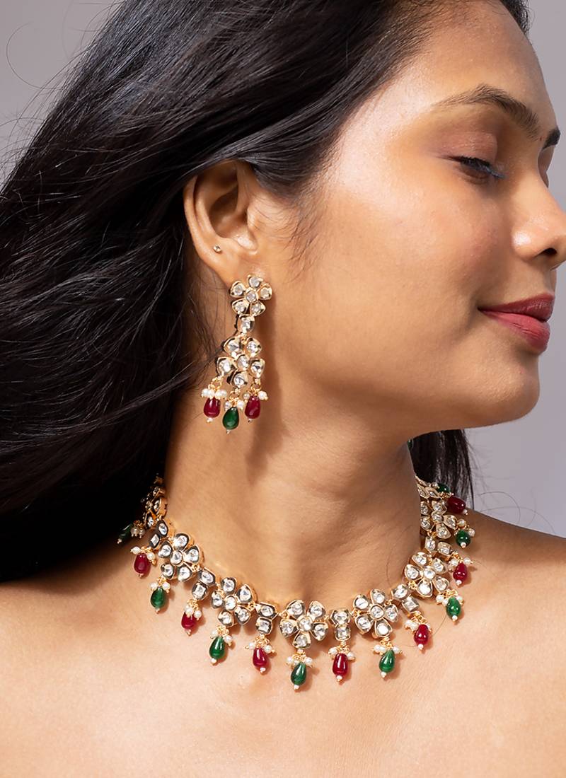 Floral kundan necklace set with ruby and emerald beads