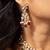 Floral kundan necklace set with ruby and emerald beads