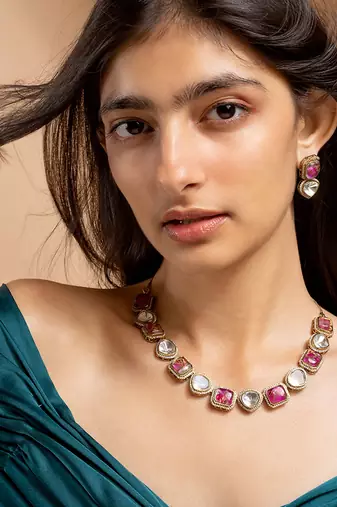 Kundan necklace and earrings set with pink stones