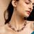 Kundan necklace and earrings set with pink stones