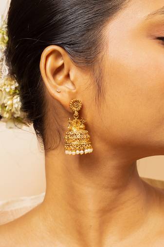 Traditional gold-plated jhumka earrings with pearl detailing