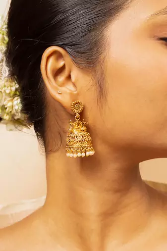 Traditional gold-plated jhumka earrings with pearl detailing
