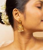 Traditional gold-plated jhumka earrings with pearl detailing