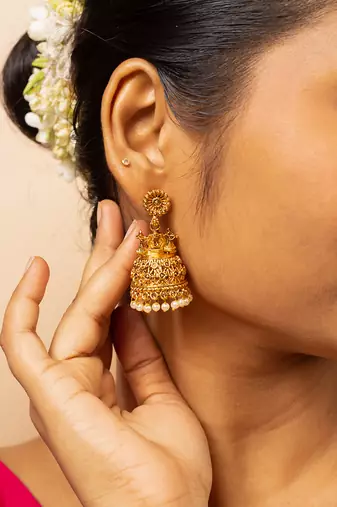 Traditional gold-plated jhumka earrings with pearl detailing