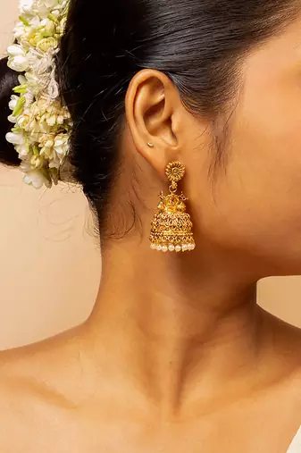 Traditional gold-plated jhumka earrings with pearl detailing