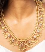 Guttapusalu long necklace with pink and white stones and matching stud earrings